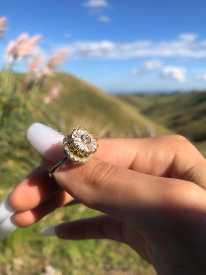 Anillo Flor de los Ciclos Giratoria