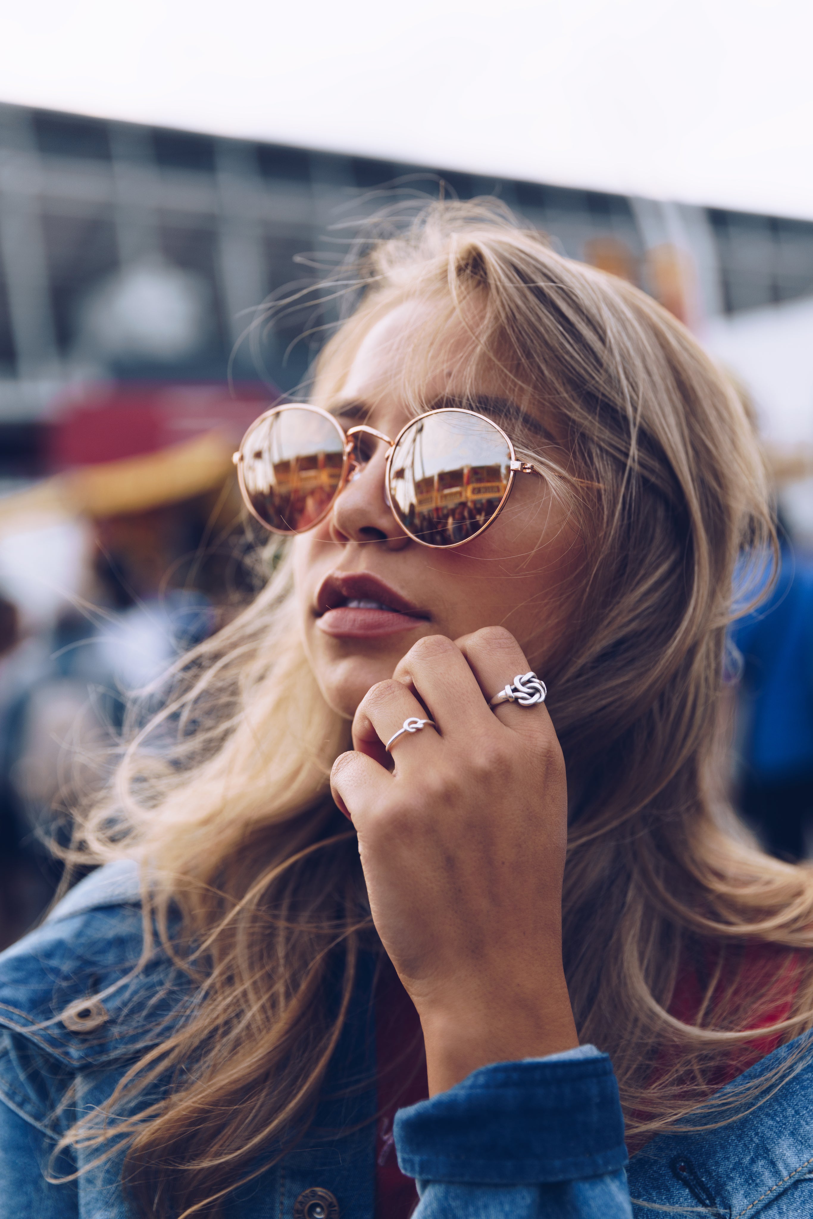 young-woman-in-sunglasses-with-rings